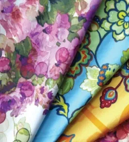 Folded printed fabric with a pink and green floral pattern