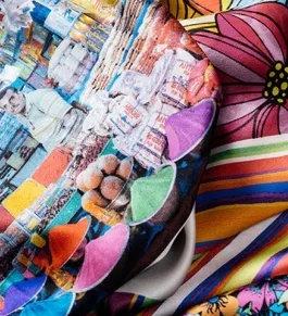 Printed polyester fabric with a saturated multicolour photographic design